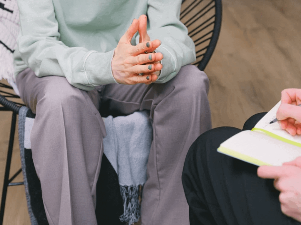 Cropped Image of Counsellor with Client